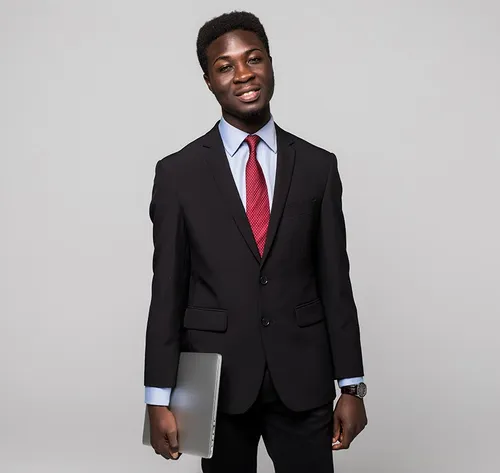 man smiling in a suit