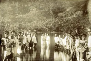 Missionaries baptize natives in Sandwich Islands (Hawaii)