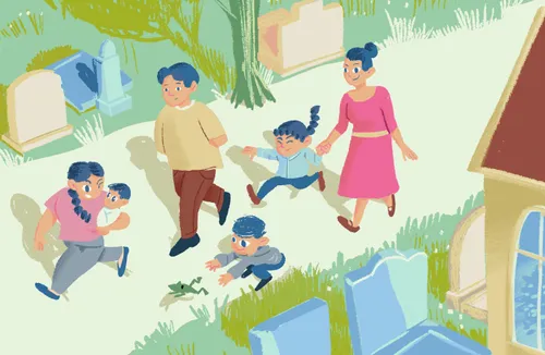 A family walking through cemetery