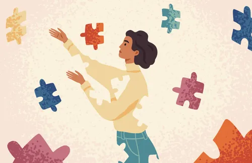 a woman assembling herself with puzzle pieces