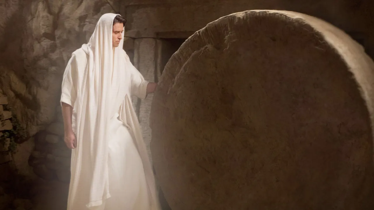 An angel opens the tomb of Jesus