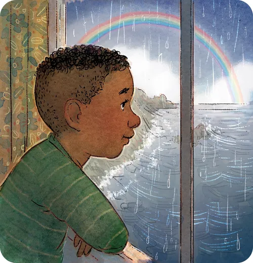 young boy looking at rainbow