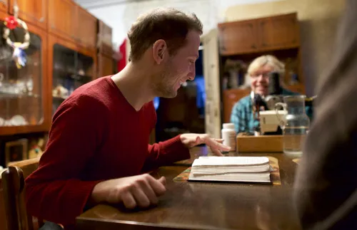 Victor Barbinyagra sitting with grandmother