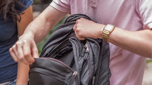 teenager opening a school bag