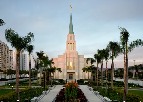 temple with palm trees outside