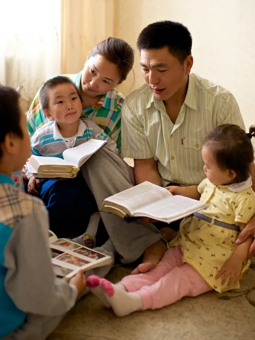 family reading scriptures