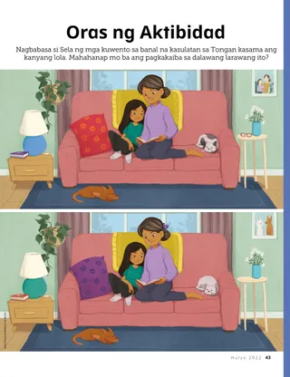 girl reading scriptures with grandma on couch