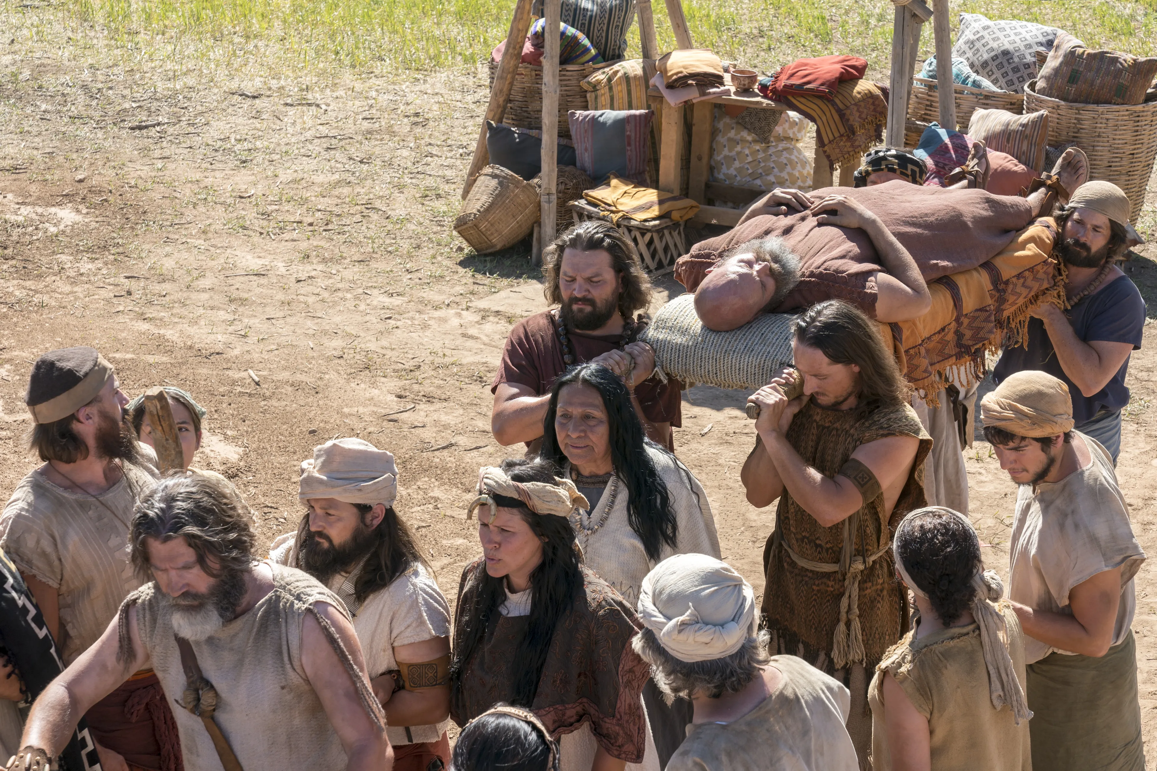 Nephites carry Sherem after he was struck down as a sign from God.