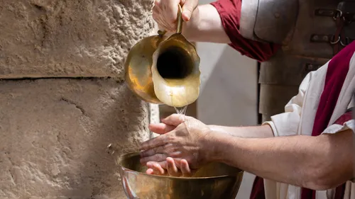 Pilate washes his hands of the decision to crucify Jesus Christ