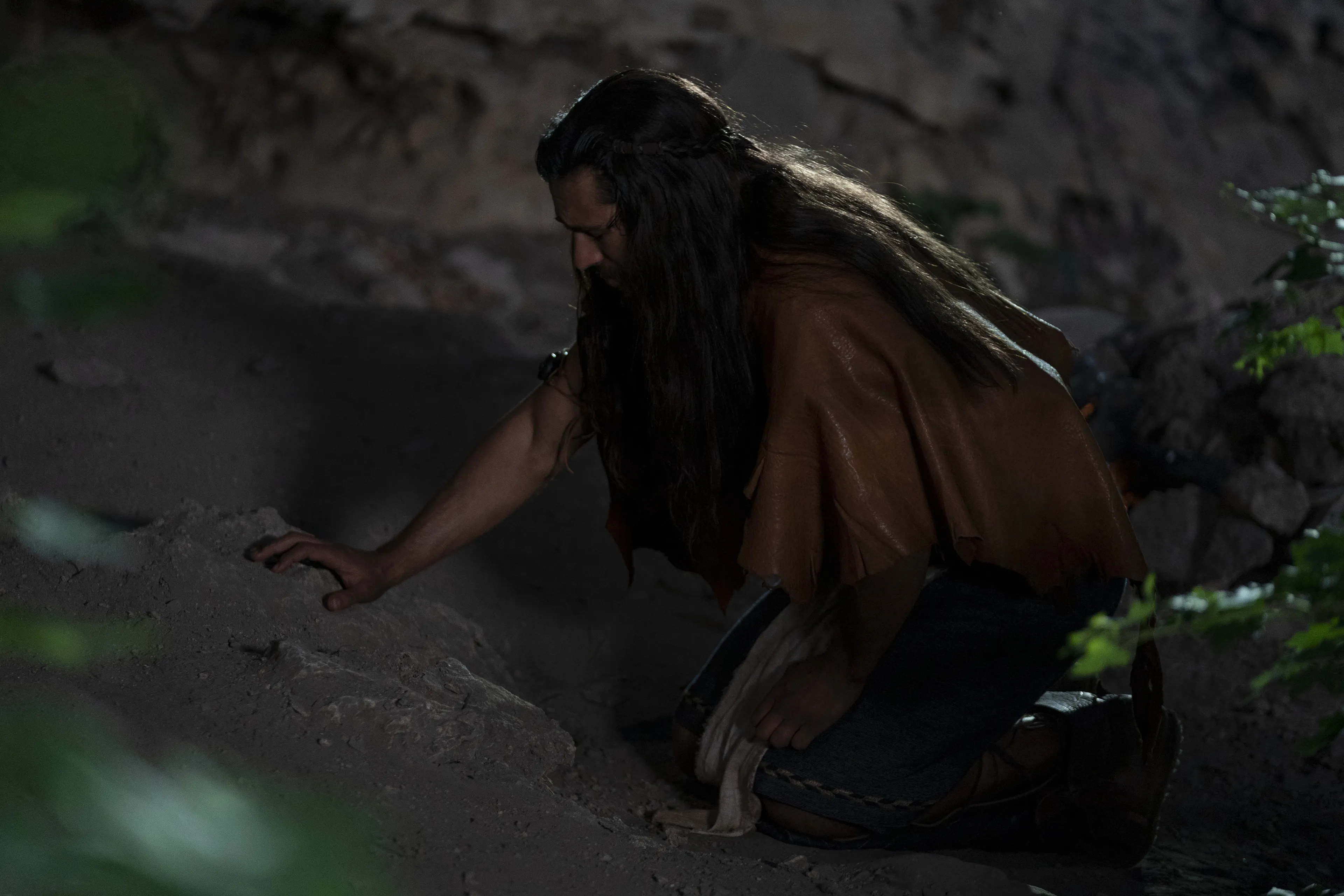 Enos prays at night.