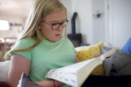 young woman reading scriptures