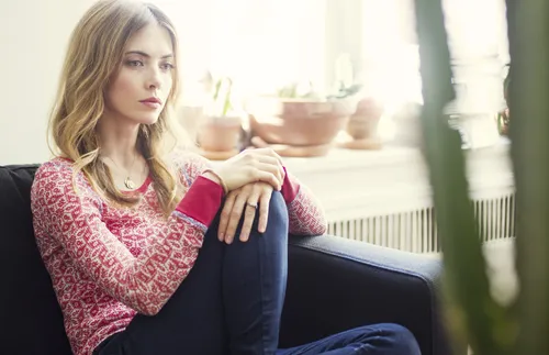 woman looking contemplative