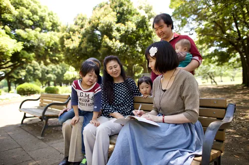 family together on a bench