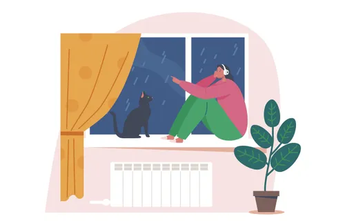 a woman wearing headphones and looking out a window