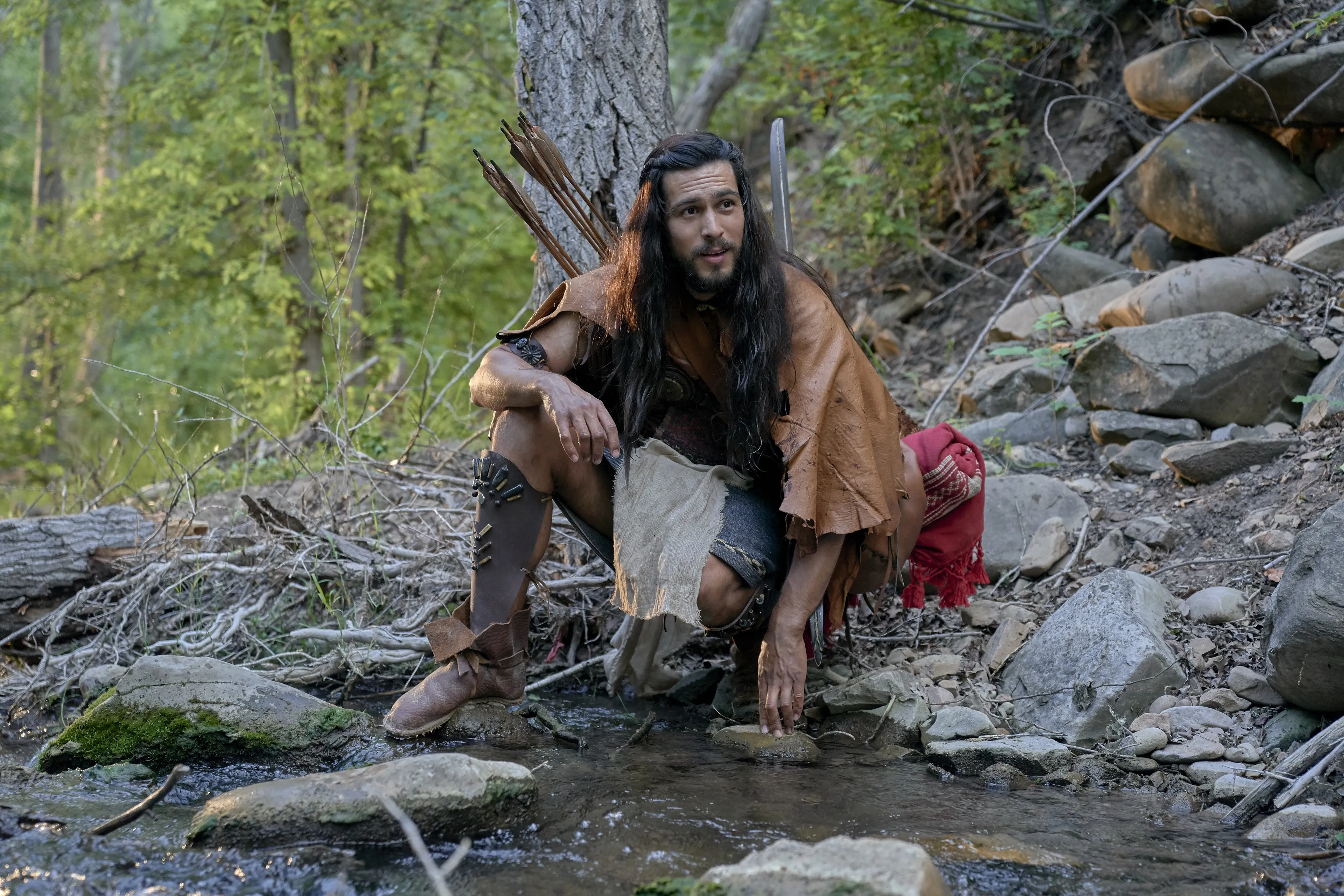 Enos hunts in the forest.