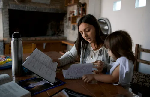 mother studying with child