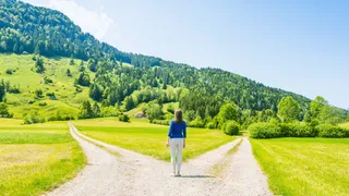 Woman at a crossroads