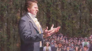 Oil painting of a side view of Joseph with hands outstretched, squinting agianst bright sunlight in the act of speaking.  He is dressed in a blue coat, orange patterened vest, dark pants and white shirt with high collar.  Several people in the audience sit at his left in rapt attention.  Tall trees are seen in the background.