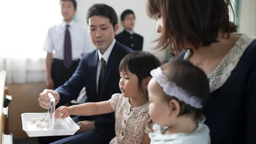 a family taking the sacrament