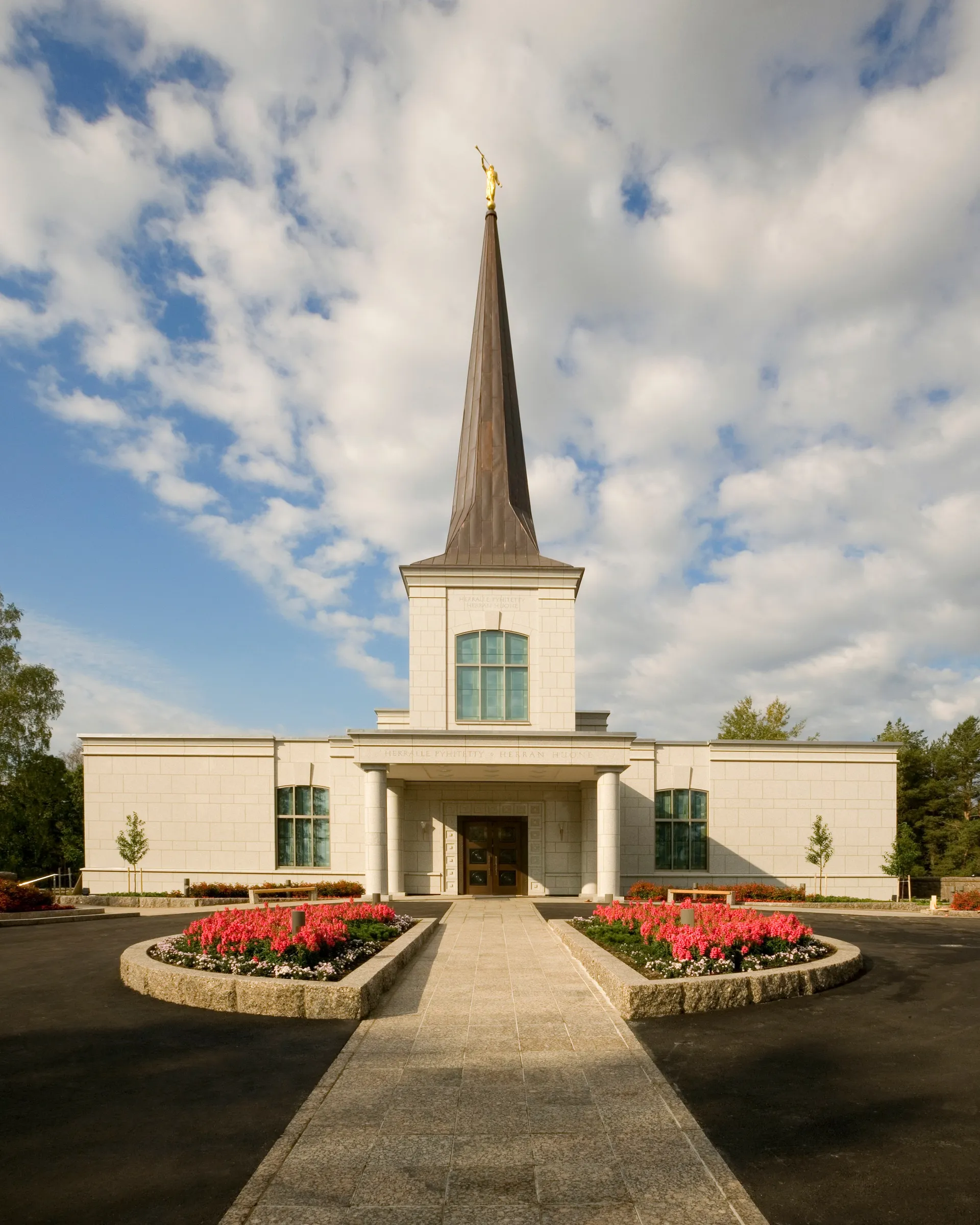 Exterior of the Helsinki Finland Temple showing the landscaped grounds.