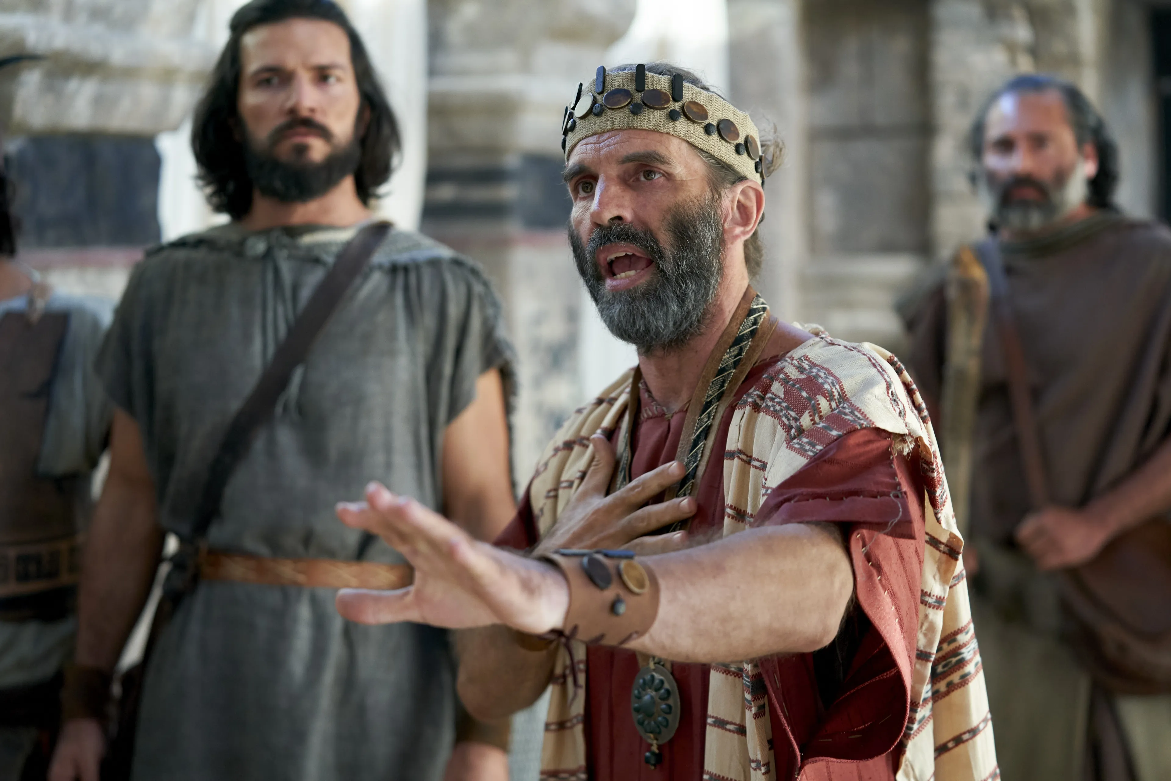 Zeezrom tries to defend Alma the Younger and Amulek as they are brought before a judge of Ammonihah.