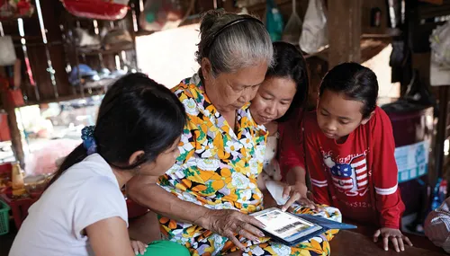 grandmother reading with children