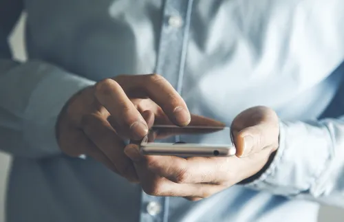 hands holding a phone