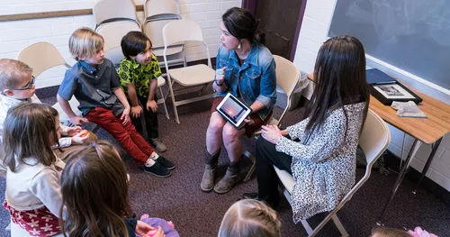 children and teachers in class