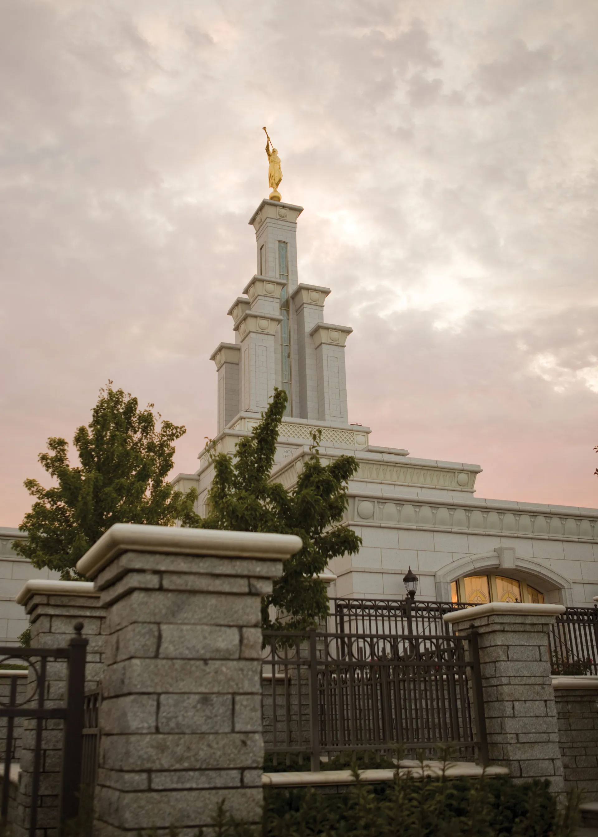 Clouds gather around the Columbia River Washington Temple in the early morning.