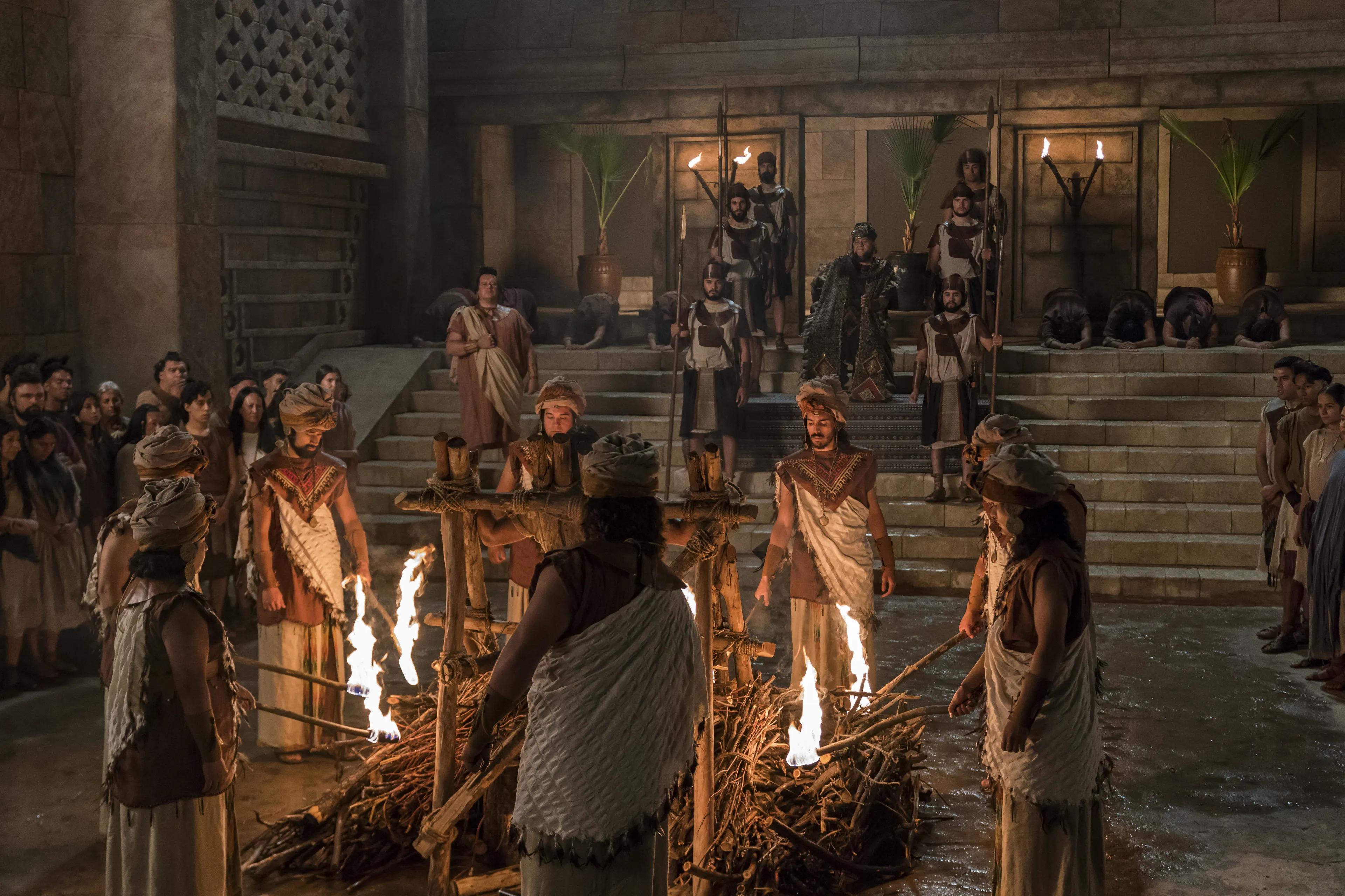 Abinadi is martyred by fire as King Noah and his priests watch.