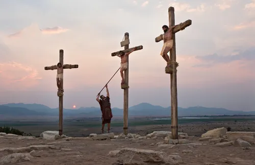 Christ being crucified