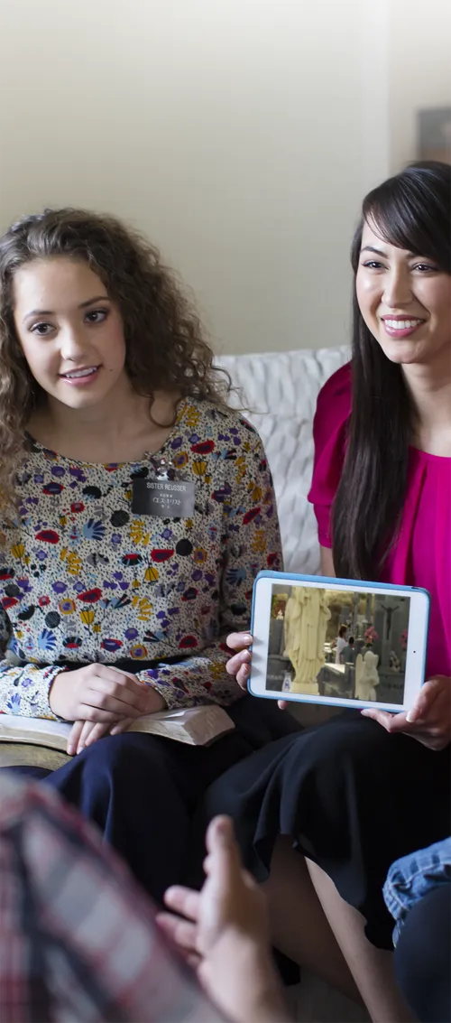 sister missionaries teaching