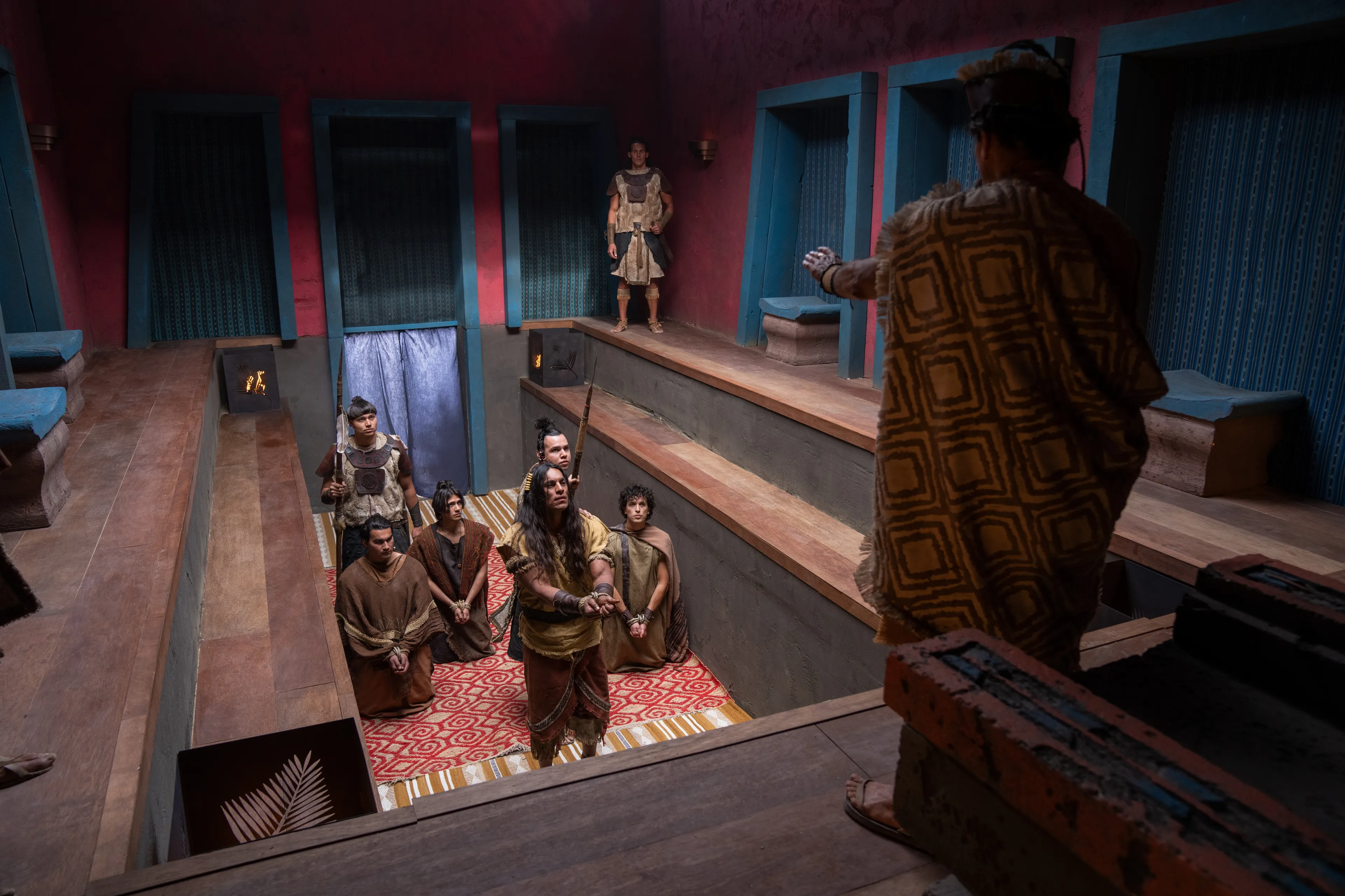 Ammon and his group of strong men are brought before King Limhi to explain why they are there.