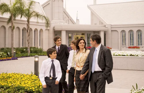 family in front of temple