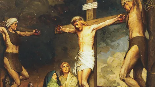 Christ crucified between two men while Mary and John look up at Him