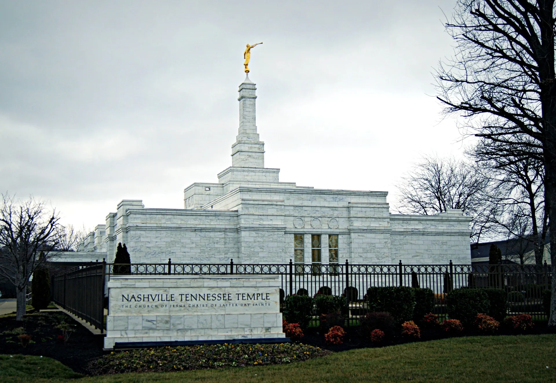 The Nashville Tennessee Temple name sign, including scenery and the exterior of the temple.