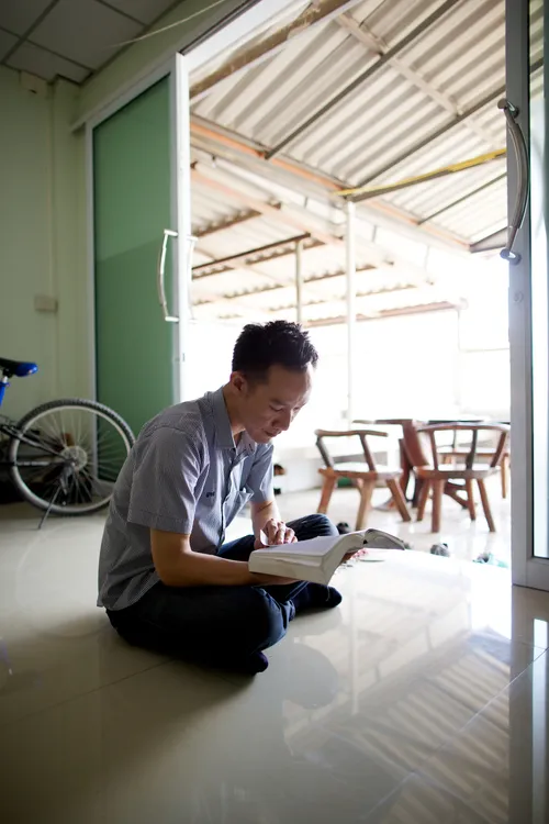 man reading scriptures