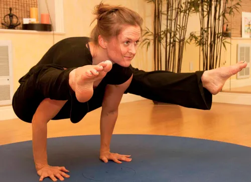 A woman doing yoga.