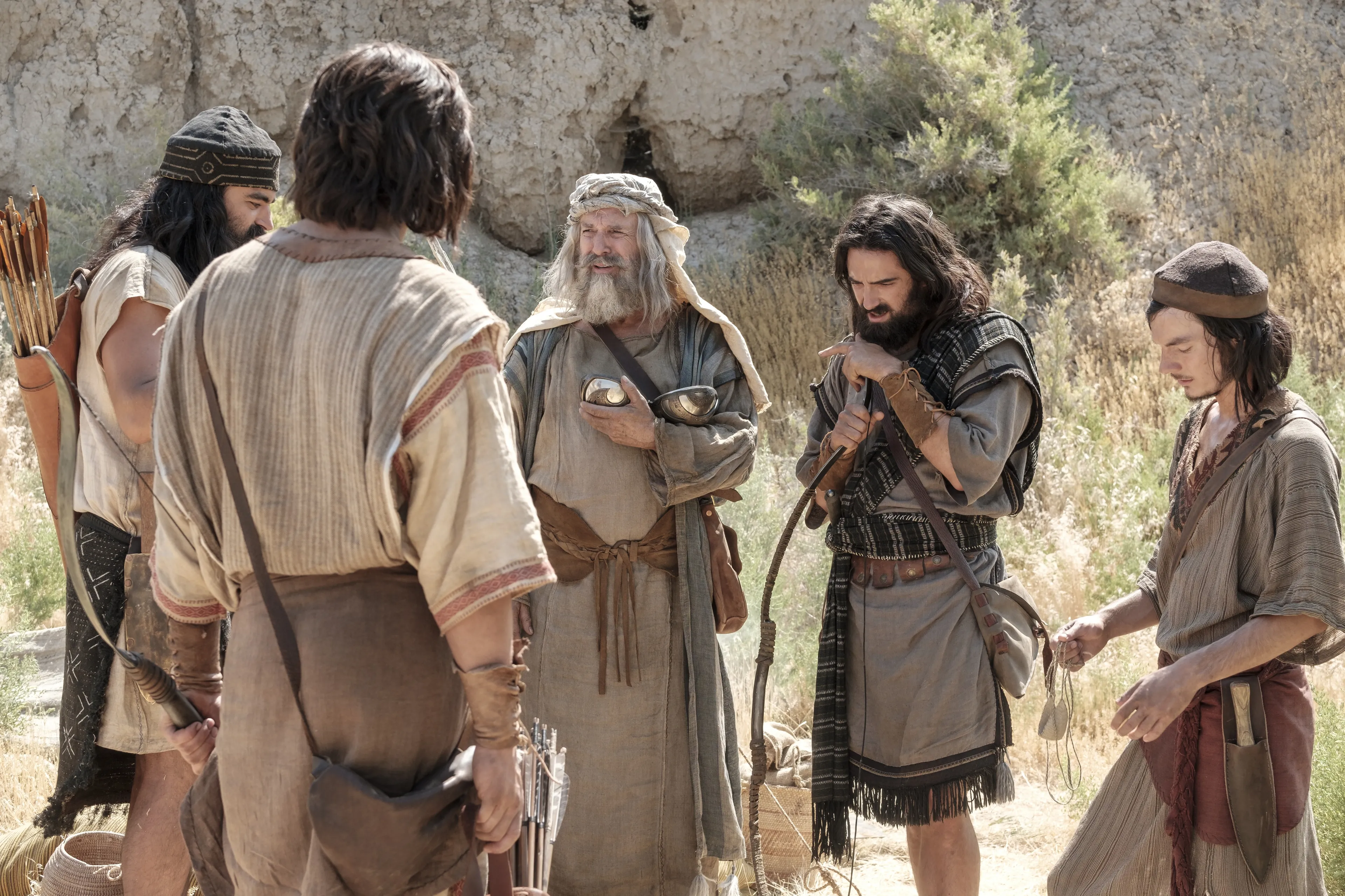 Lehi uses the Liahona to direct his sons where to hunt in the wilderness.