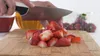 cutting strawberries