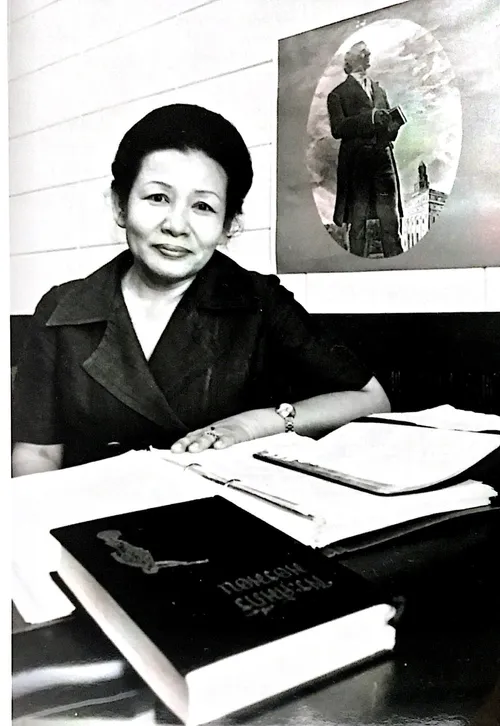 woman sitting at desk