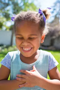 Children (boys and girls) laughing.