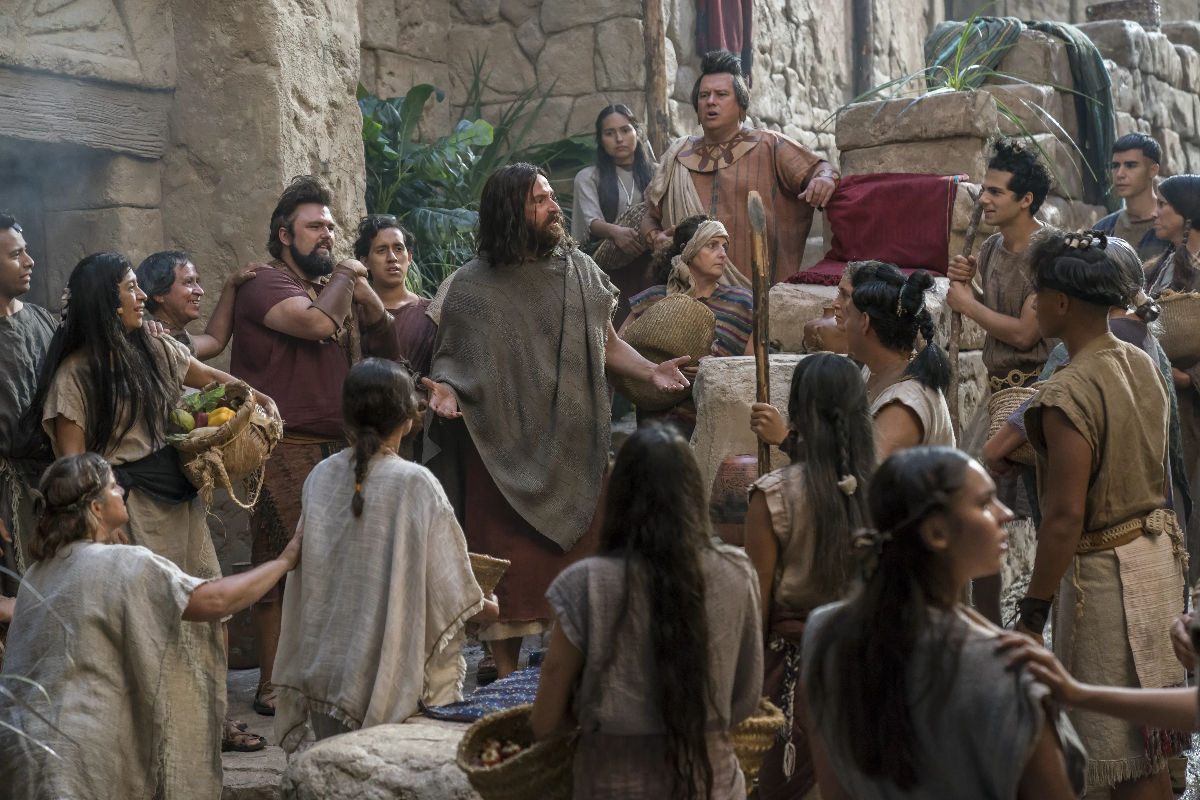 A small group of listeners gathers to listen to Abinadi preach.