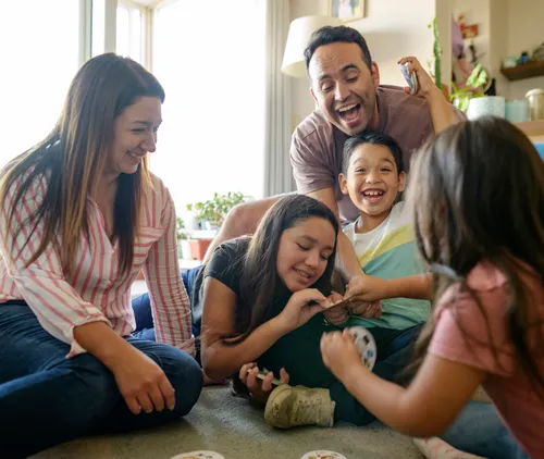 Santiago laughing with his family