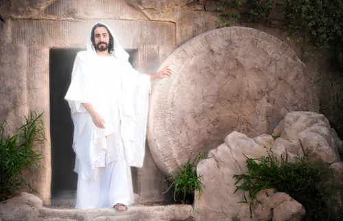 Jesus Christ walking out of the tomb