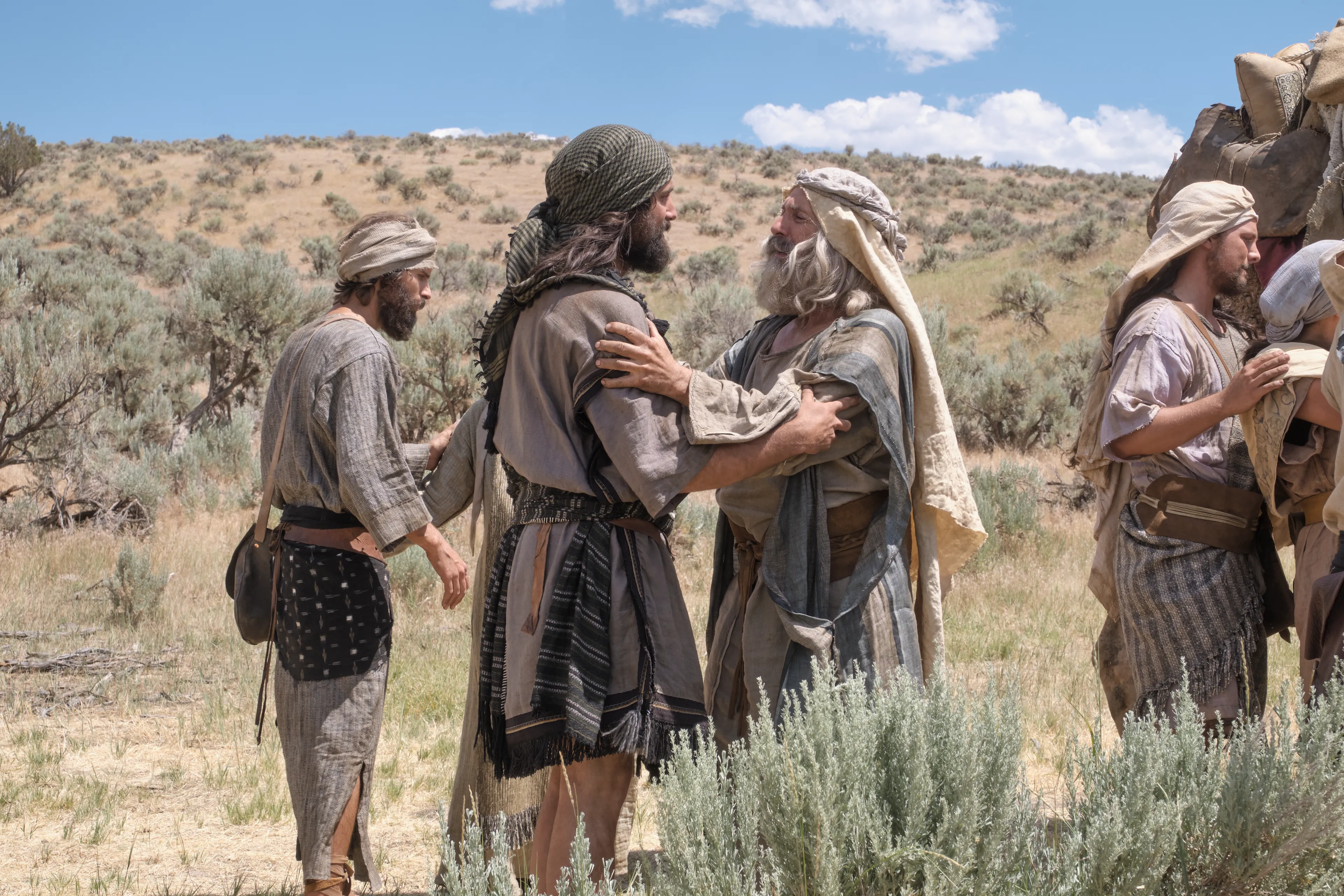 Lehi greets Lemuel upon his return from Jerusalem.
