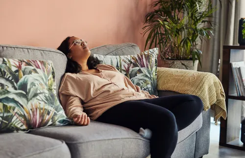 discouraged woman on a couch