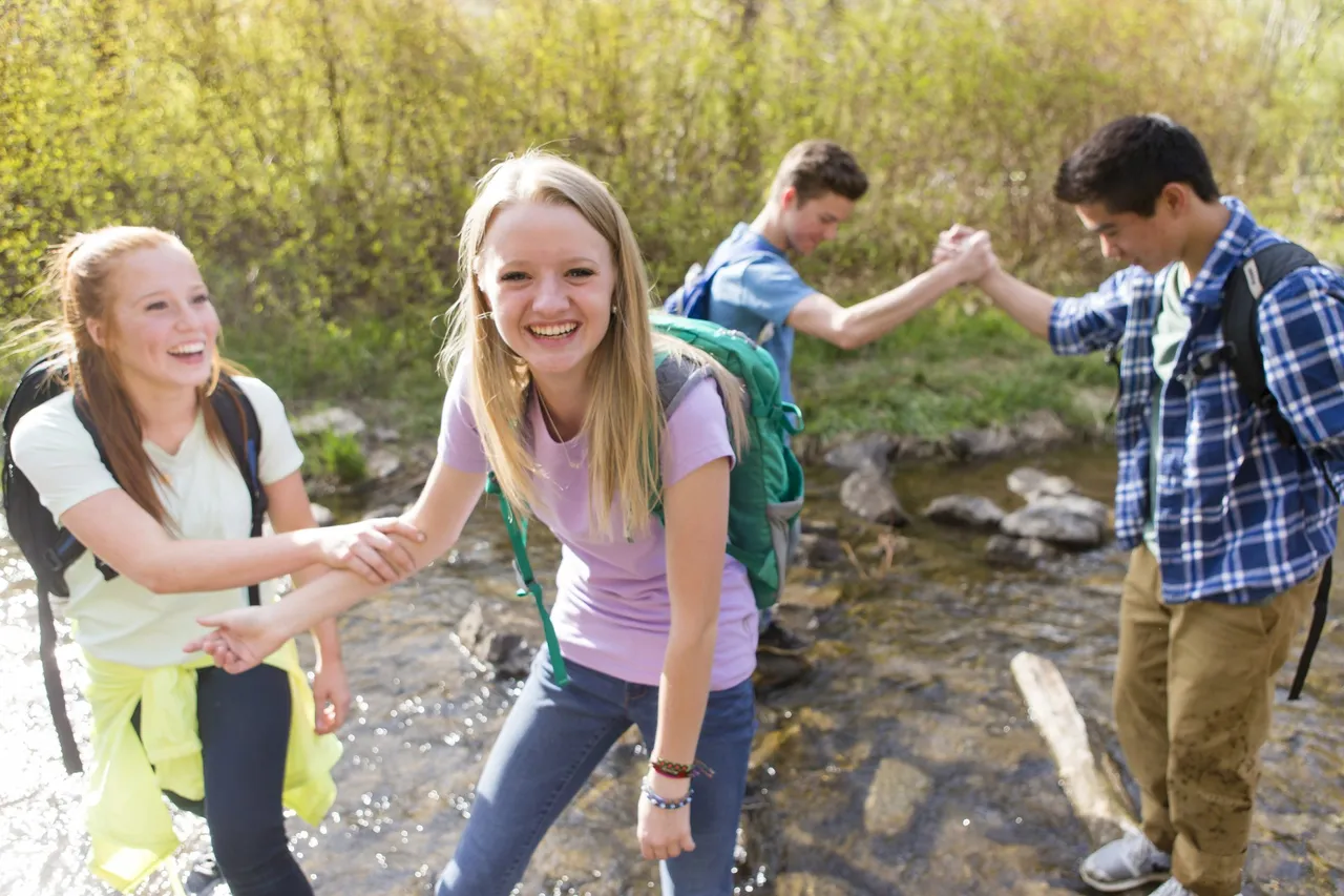 A group of young people participate in a youth activity