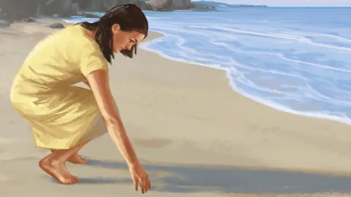 lady searching in the sand