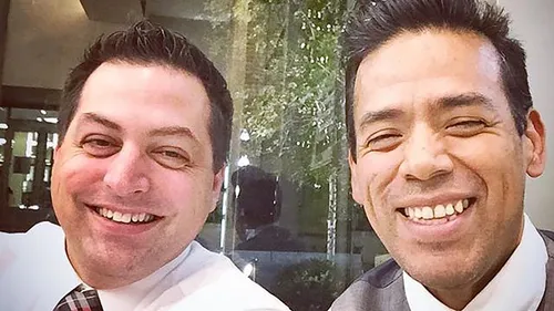 Nick and Ricardo smiling